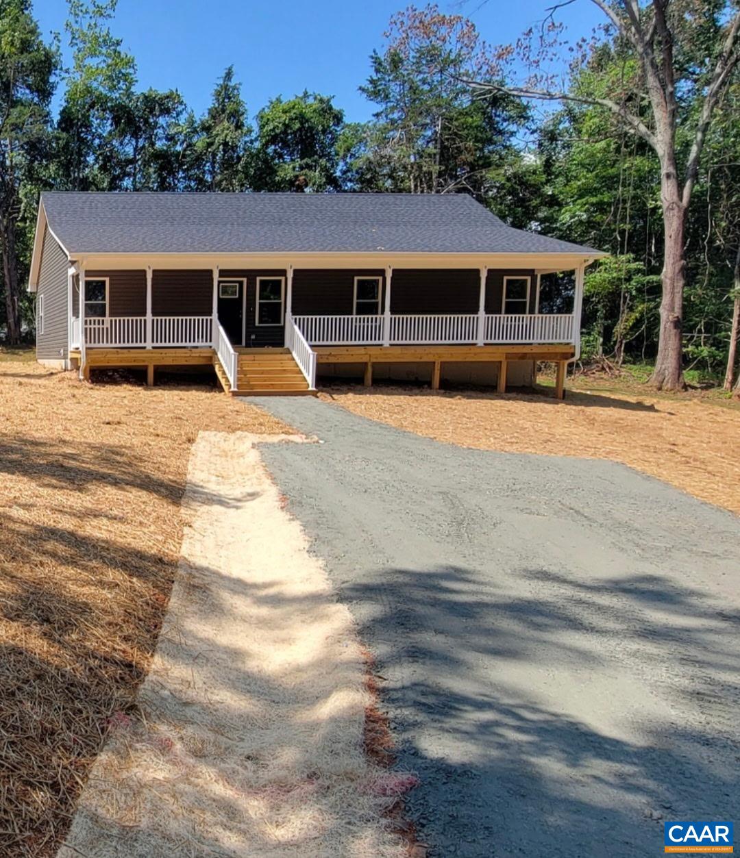 68 Agnes Gordon Trail Stanardsville, VA 22973 - Photo 1 of 1 a front view of a house with large windows