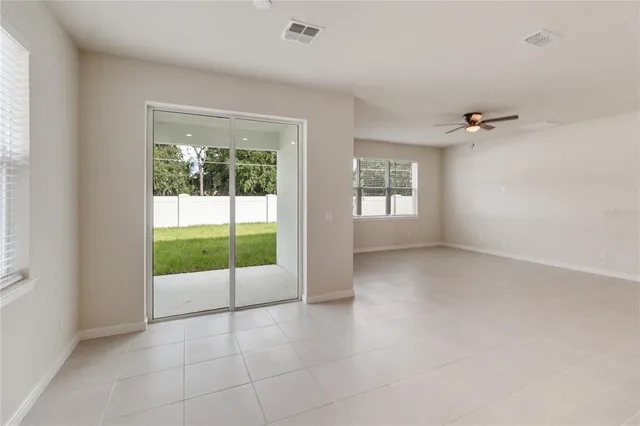 a view of an empty room and window