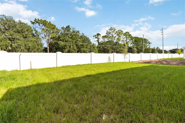 a view of an outdoor space and a yard