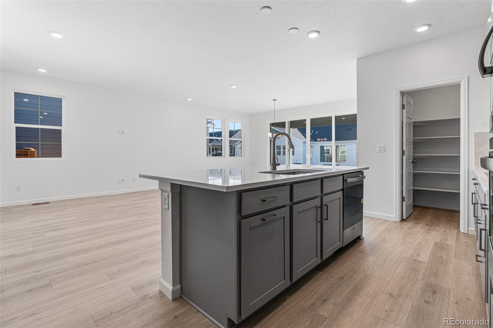 23936 River Front Drive Aurora, CO 80019 - Photo 12 of 46 a bathroom with a double vanity sink and a mirror