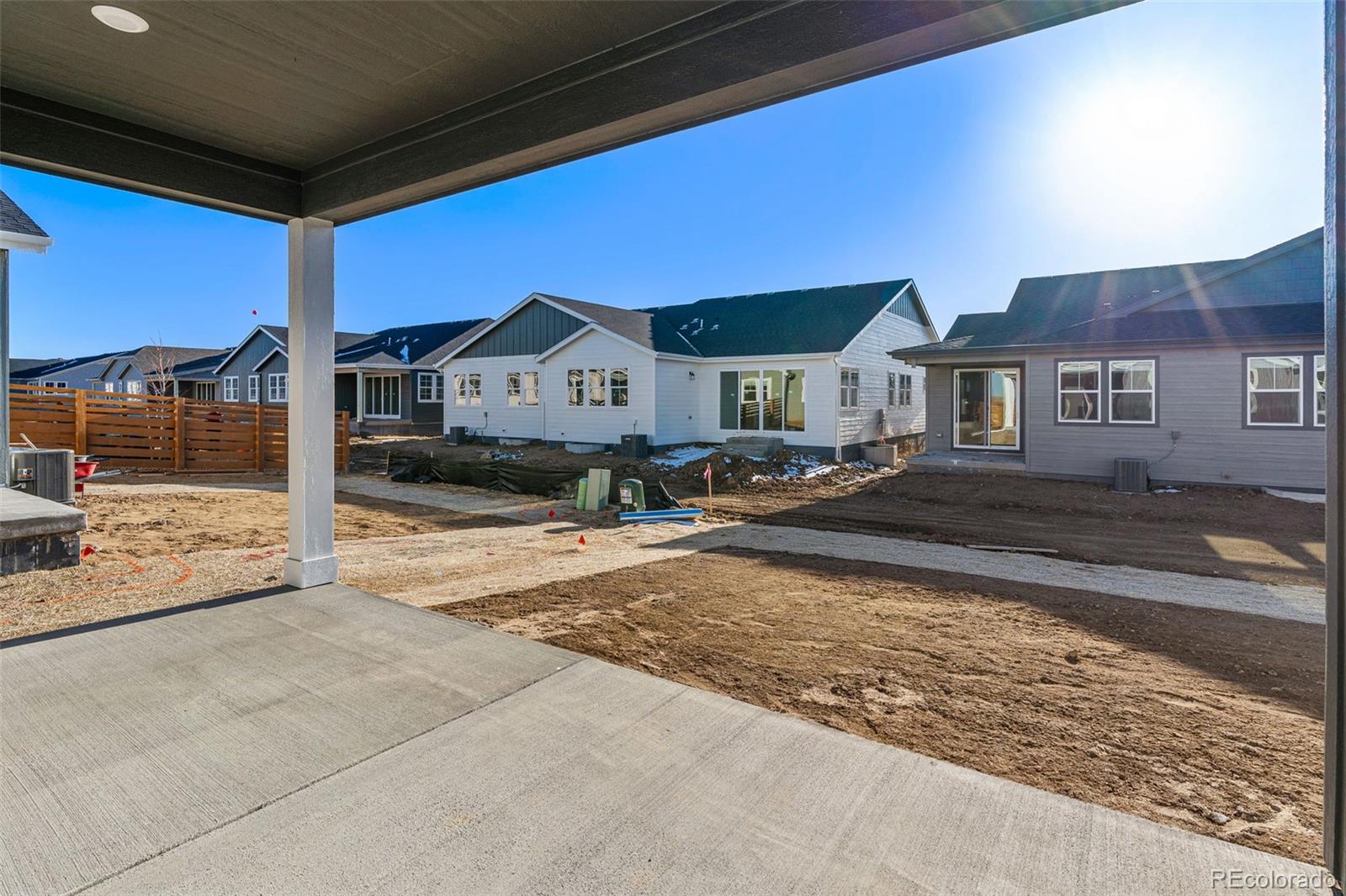 23936 River Front Drive Aurora, CO 80019 - Photo 32 of 46 a view of a house with a patio