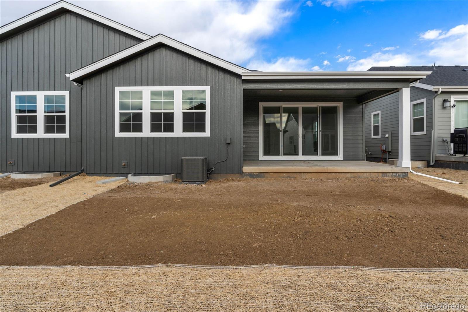 23936 River Front Drive Aurora, CO 80019 - Photo 34 of 46 a front view of a house