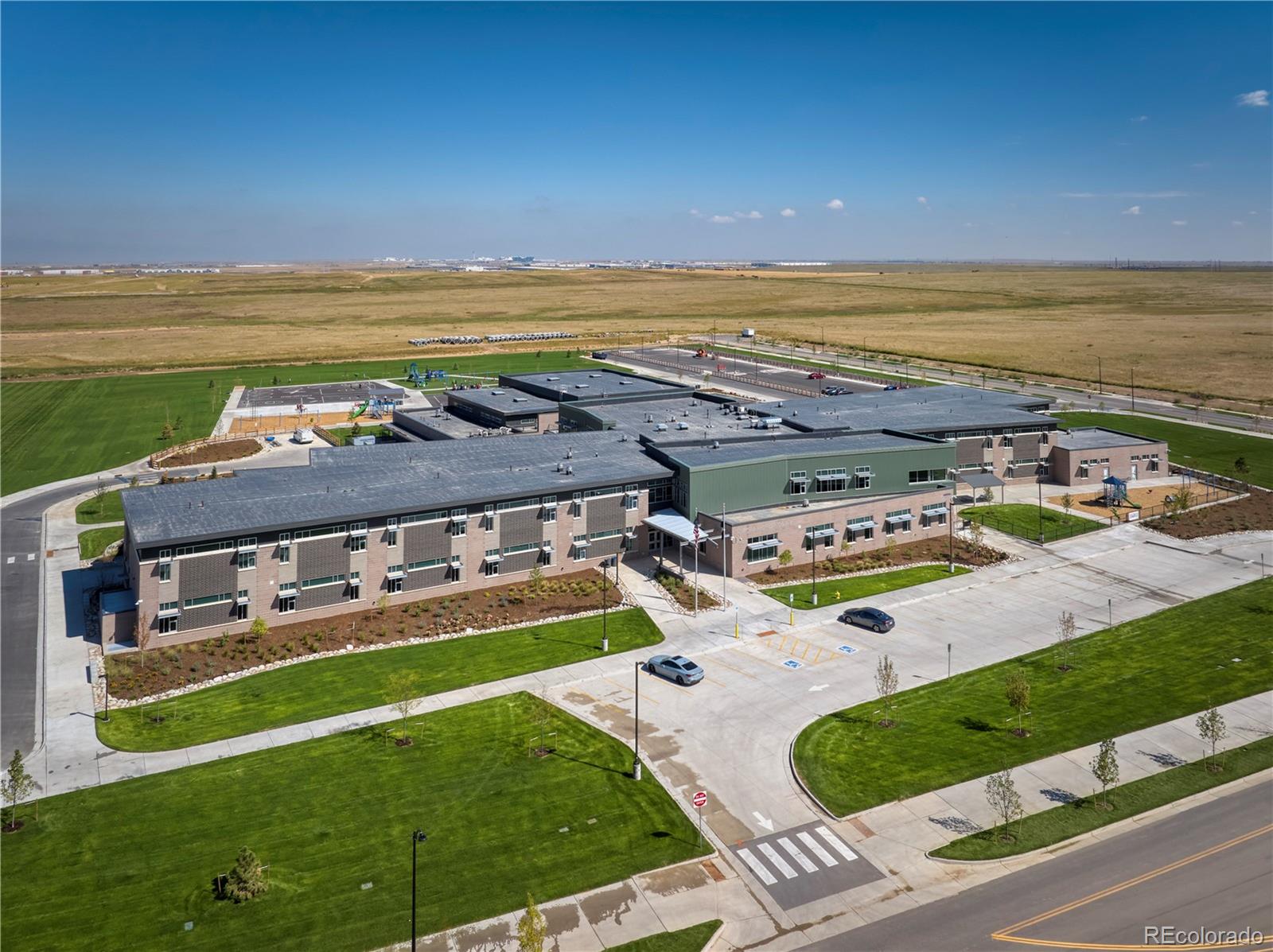 23936 River Front Drive Aurora, CO 80019 - Photo 46 of 46 a view of a swimming pool with an ocean view