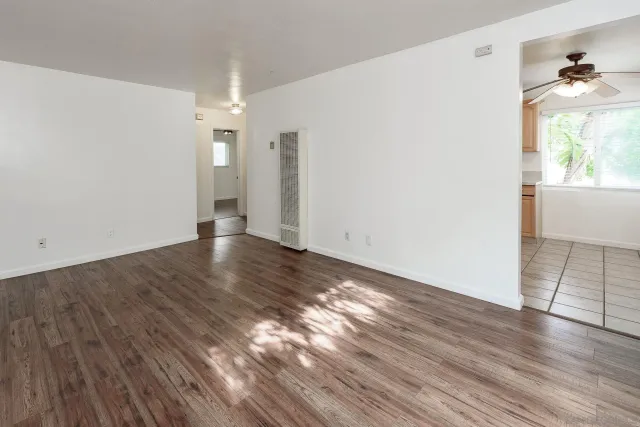 a view of wooden floor in an empty room