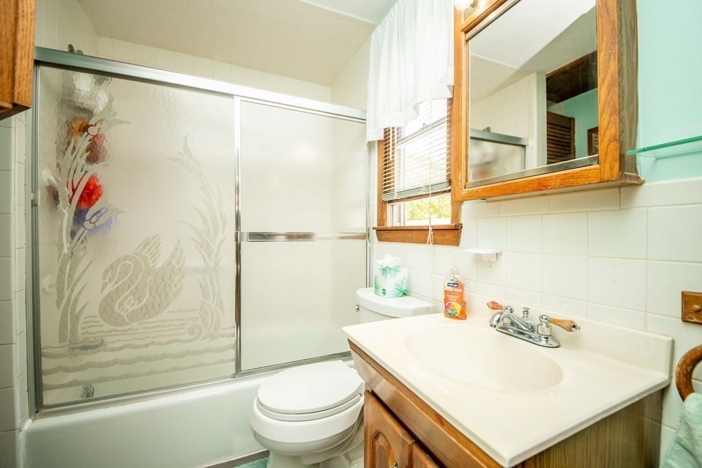 9 Grant Street Wareham, MA 02571 - Photo 14 of 18 a bathroom with a sink toilet and shower