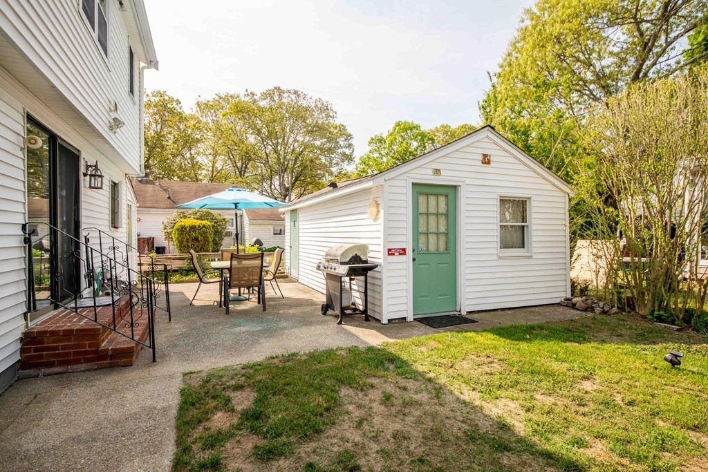 9 Grant Street Wareham, MA 02571 - Photo 3 of 18 a view of a house with a patio
