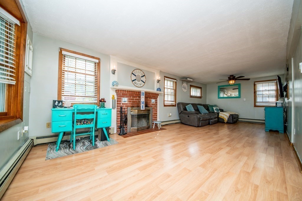 9 Grant Street Wareham, MA 02571 - Photo 4 of 18 a room with furniture and a flat screen tv