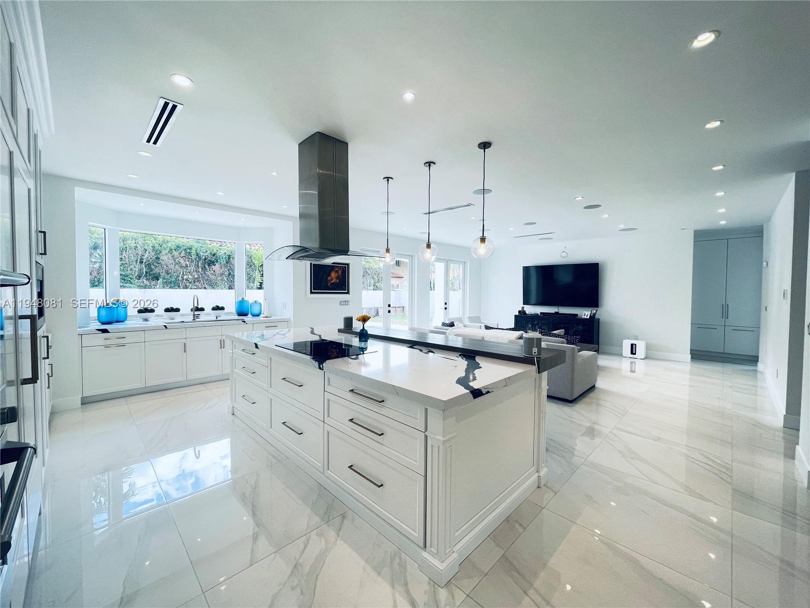 7233 Southwest 122 Place Miami, FL 33183 - Photo 15 of 78 a kitchen with appliances cabinets and a counter top space
