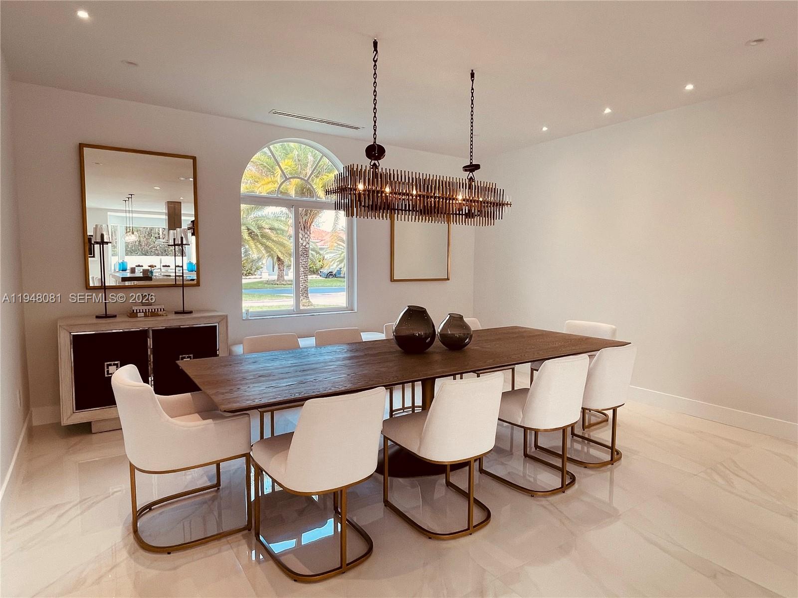 7233 Southwest 122 Place Miami, FL 33183 - Photo 20 of 58 a view of a dining room with furniture window and wooden floor