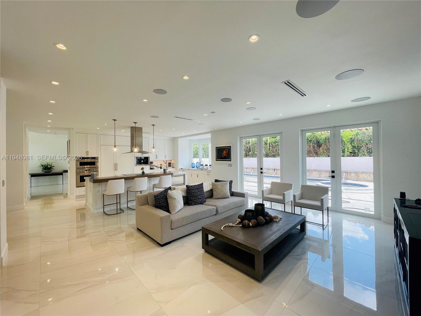 7233 Southwest 122 Place Miami, FL 33183 - Photo 25 of 58 a living room with furniture and a table