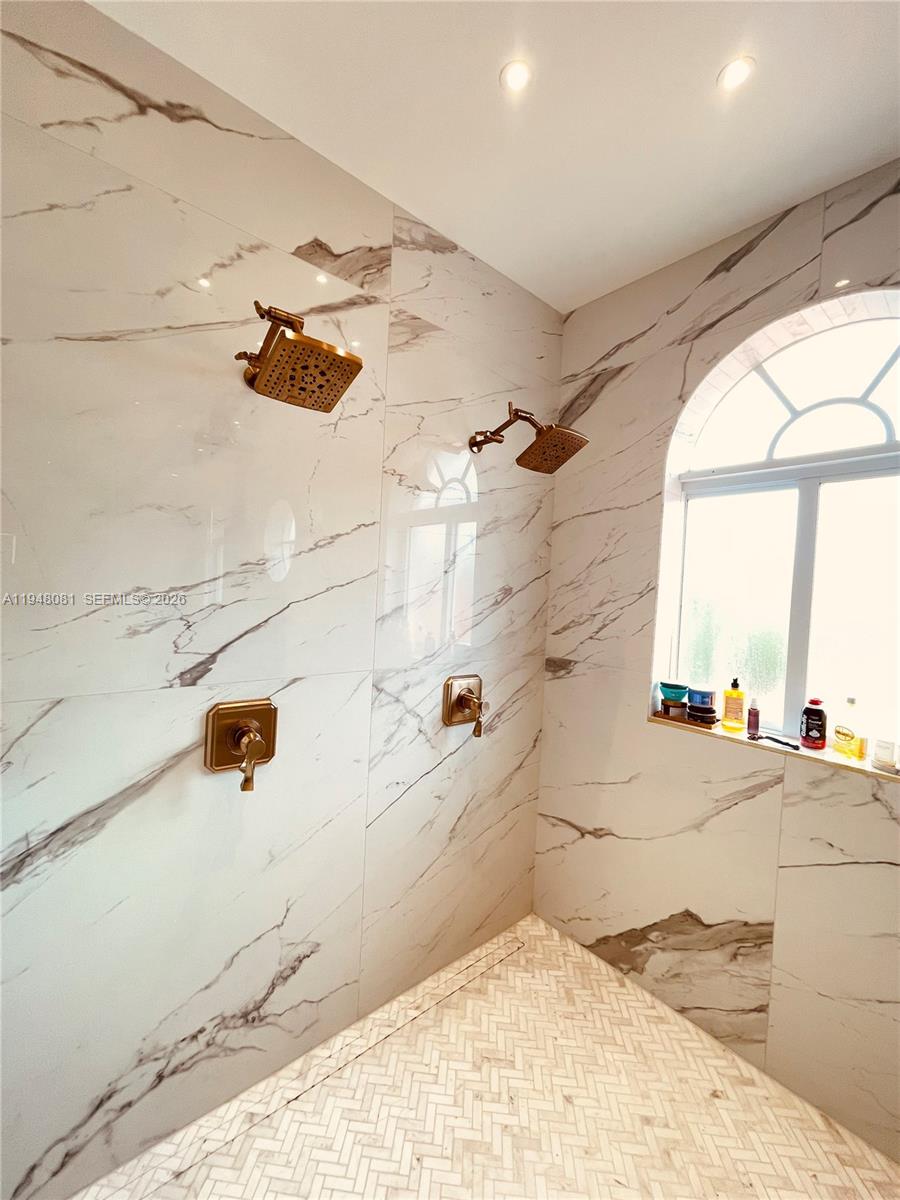 7233 Southwest 122 Place Miami, FL 33183 - Photo 47 of 58 a bathroom with a bathtub and a shower