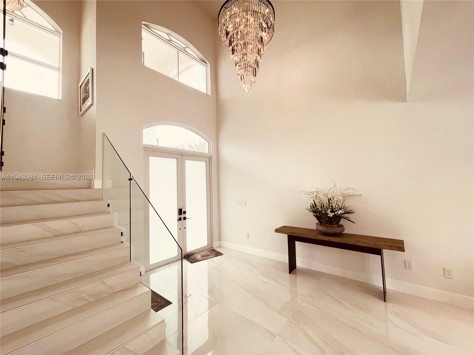 7233 Southwest 122 Place Miami, FL 33183 - Photo 9 of 78 a view of entryway and hall with wooden floor