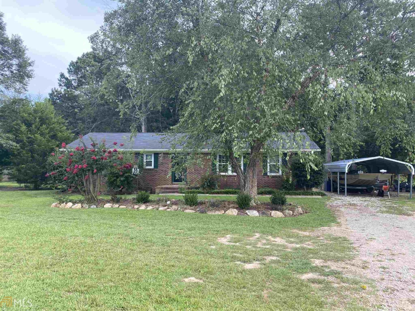3346 Teamon Road Griffin, GA 30223 - Photo 1 of 1 a front view of a house with garden