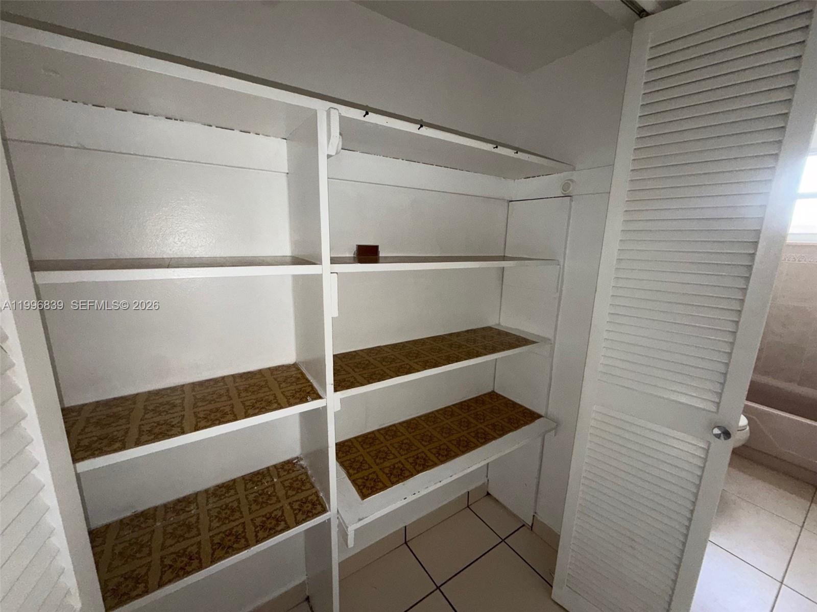 120 Royal Palm Road, Unit 301 Hialeah Gardens, FL 33016 - Photo 13 of 32 a walk in closet