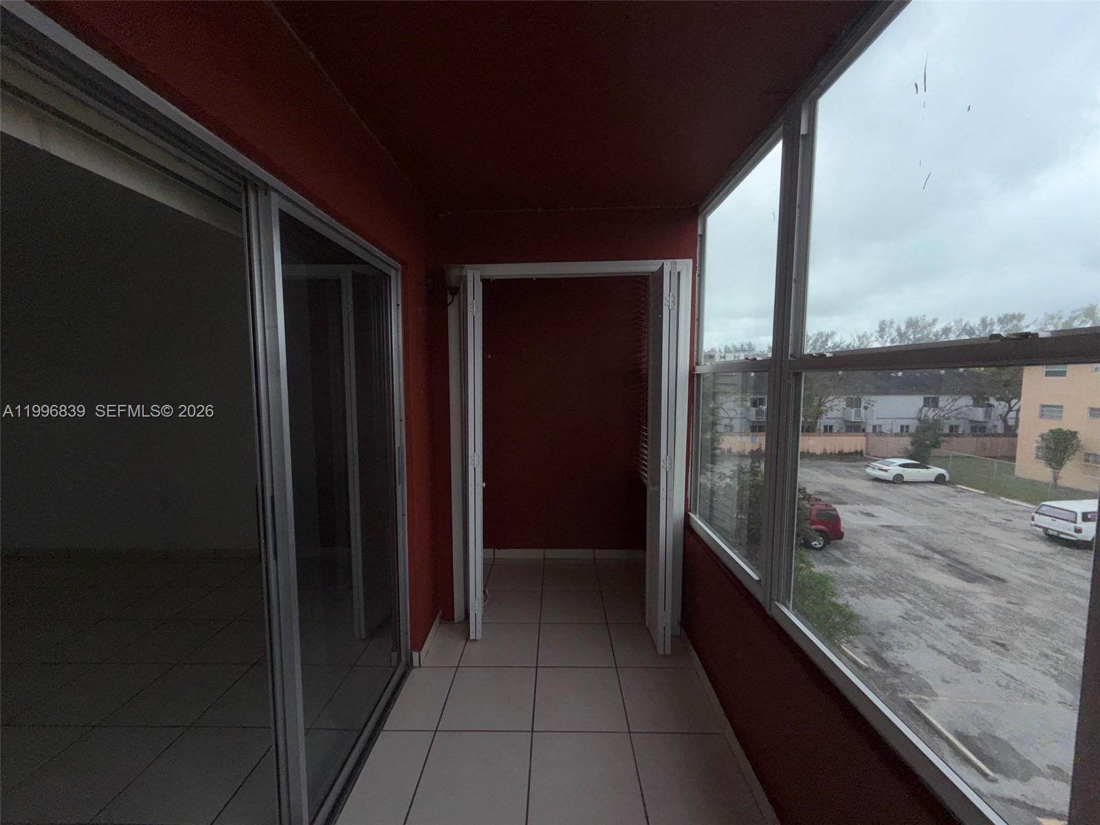 120 Royal Palm Road, Unit 301 Hialeah Gardens, FL 33016 - Photo 25 of 32 a view of a balcony