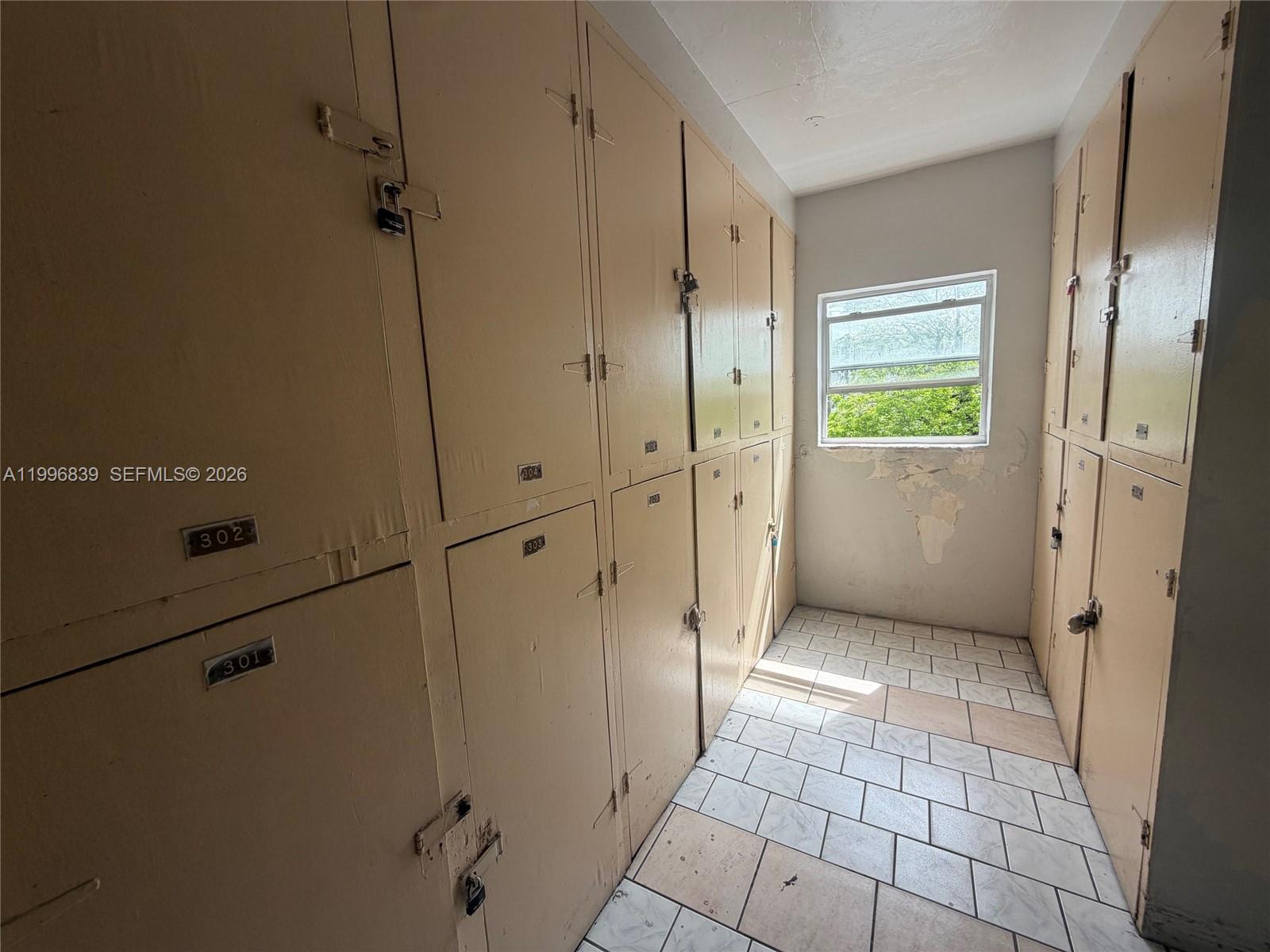 120 Royal Palm Road, Unit 301 Hialeah Gardens, FL 33016 - Photo 29 of 32 a view of an empty room