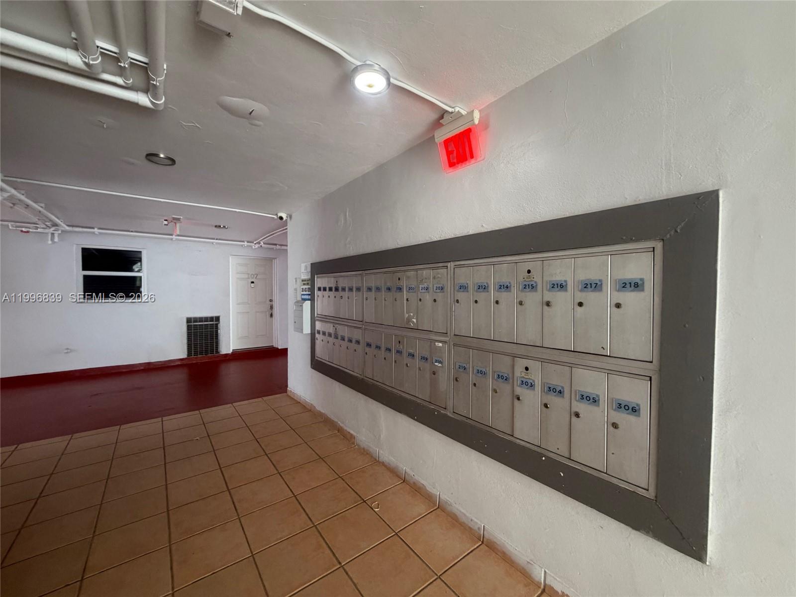 120 Royal Palm Road, Unit 301 Hialeah Gardens, FL 33016 - Photo 31 of 32 a view of an empty room with wooden floor