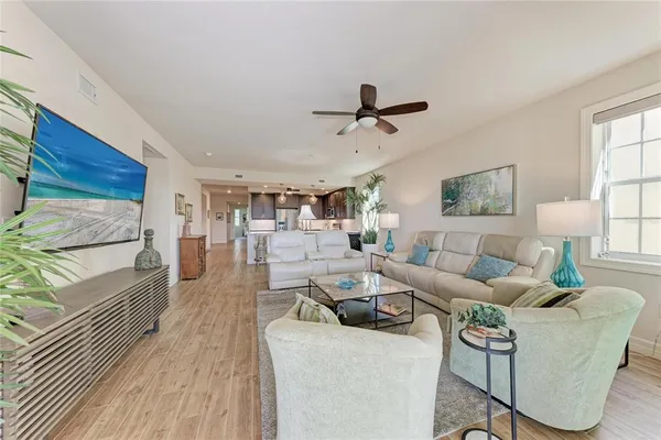 a kitchen with a sink and a refrigerator