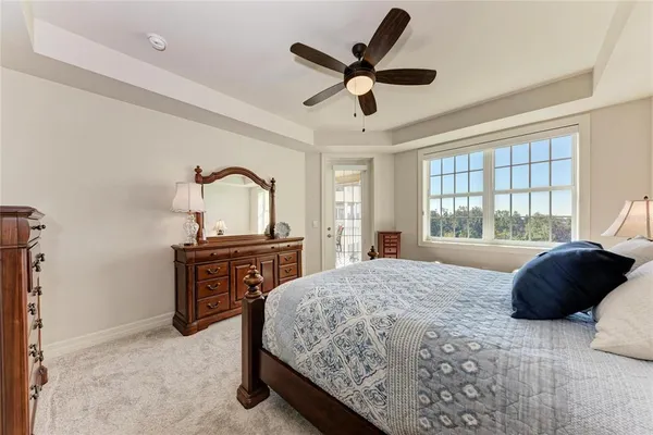 a bed room with a bed and a dresser
