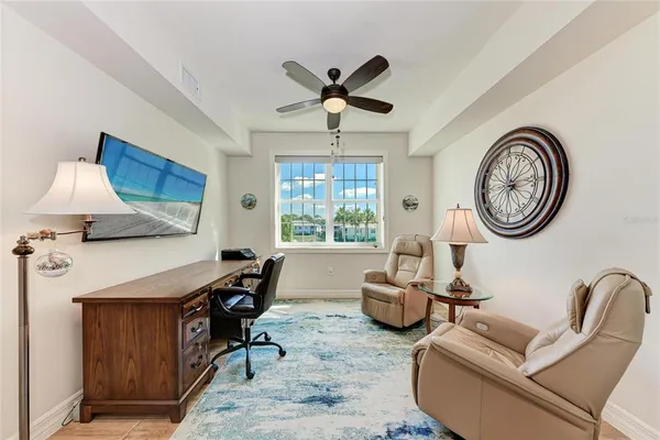 a bed room with a bed and a chandelier