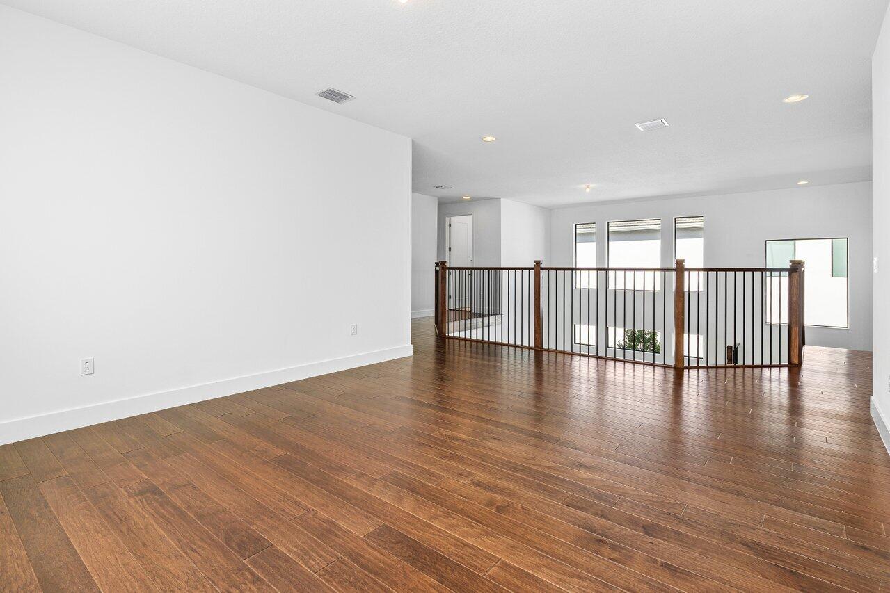 17056 Teton River Road Boca Raton, FL 33496 - Photo 26 of 76 a view of a room with wooden floor