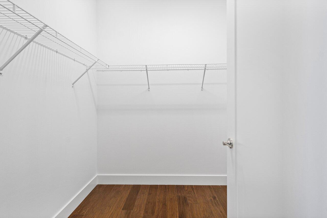 17056 Teton River Road Boca Raton, FL 33496 - Photo 34 of 76 a view of a room with racks on the wall