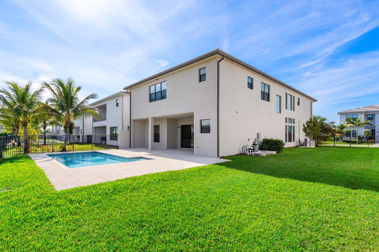 17056 Teton River Road Boca Raton, FL 33496 - Photo 44 of 76 a view of a house with a yard