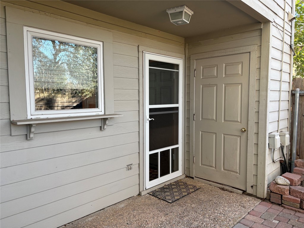 9226 Jollyville Road, Unit 144 Austin, TX 78759 - Photo 28 of 40 Back Door with storage closet off of private back patio