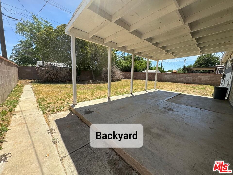 44720 Rodin Avenue Lancaster, CA 93535 - Photo 16 of 18 a view of a indoor basketball court