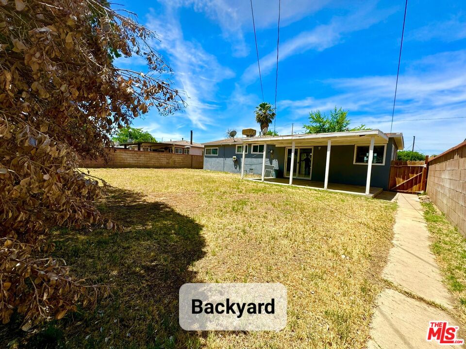 44720 Rodin Avenue Lancaster, CA 93535 - Photo 18 of 18 a view of a house with a yard