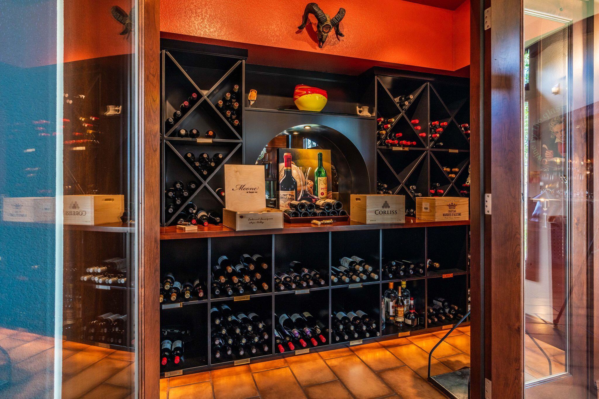 65904 Fazio Ln Bend Bend, OR 97701 - Photo 23 of 63 980 bottle storage, temperature-controlled and conveniently located in the Formal Dining Room.