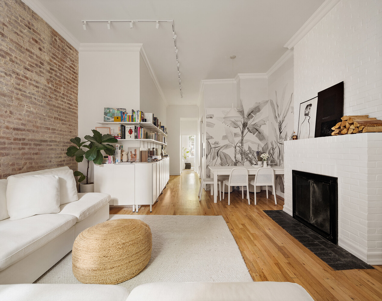 172 West 82nd Street, Unit 2A Manhattan, NY 10024 - Photo 2 of 9 a living room with furniture a fireplace and a flat screen tv