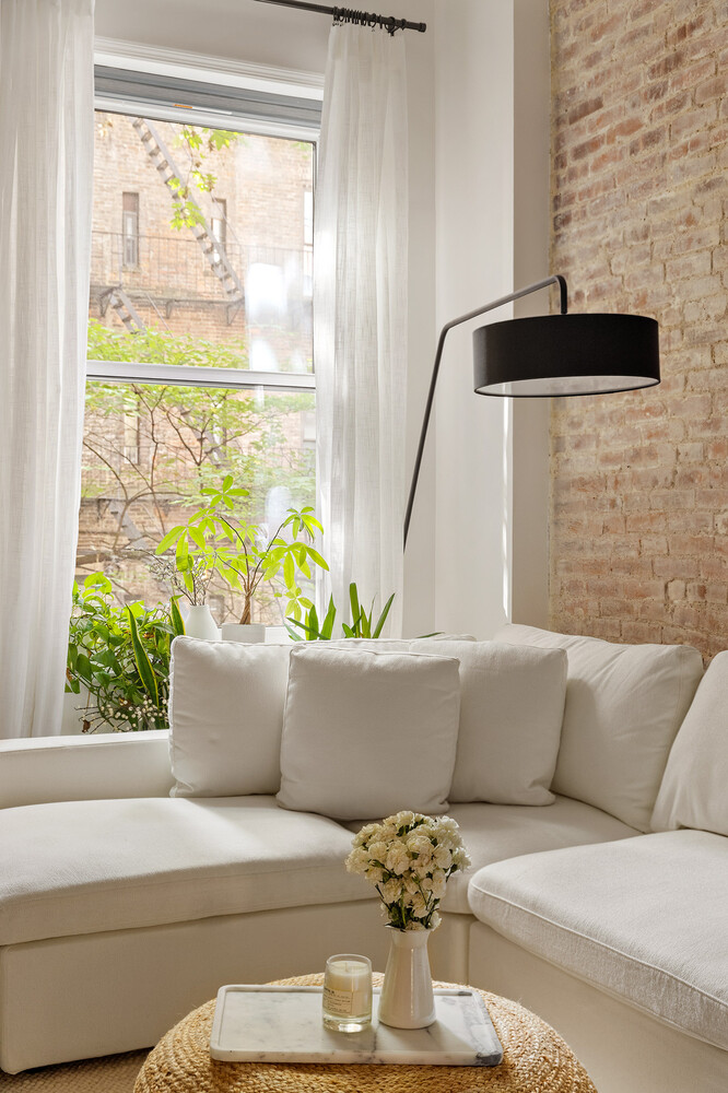 172 West 82nd Street, Unit 2A Manhattan, NY 10024 - Photo 3 of 9 a living room with furniture and a window