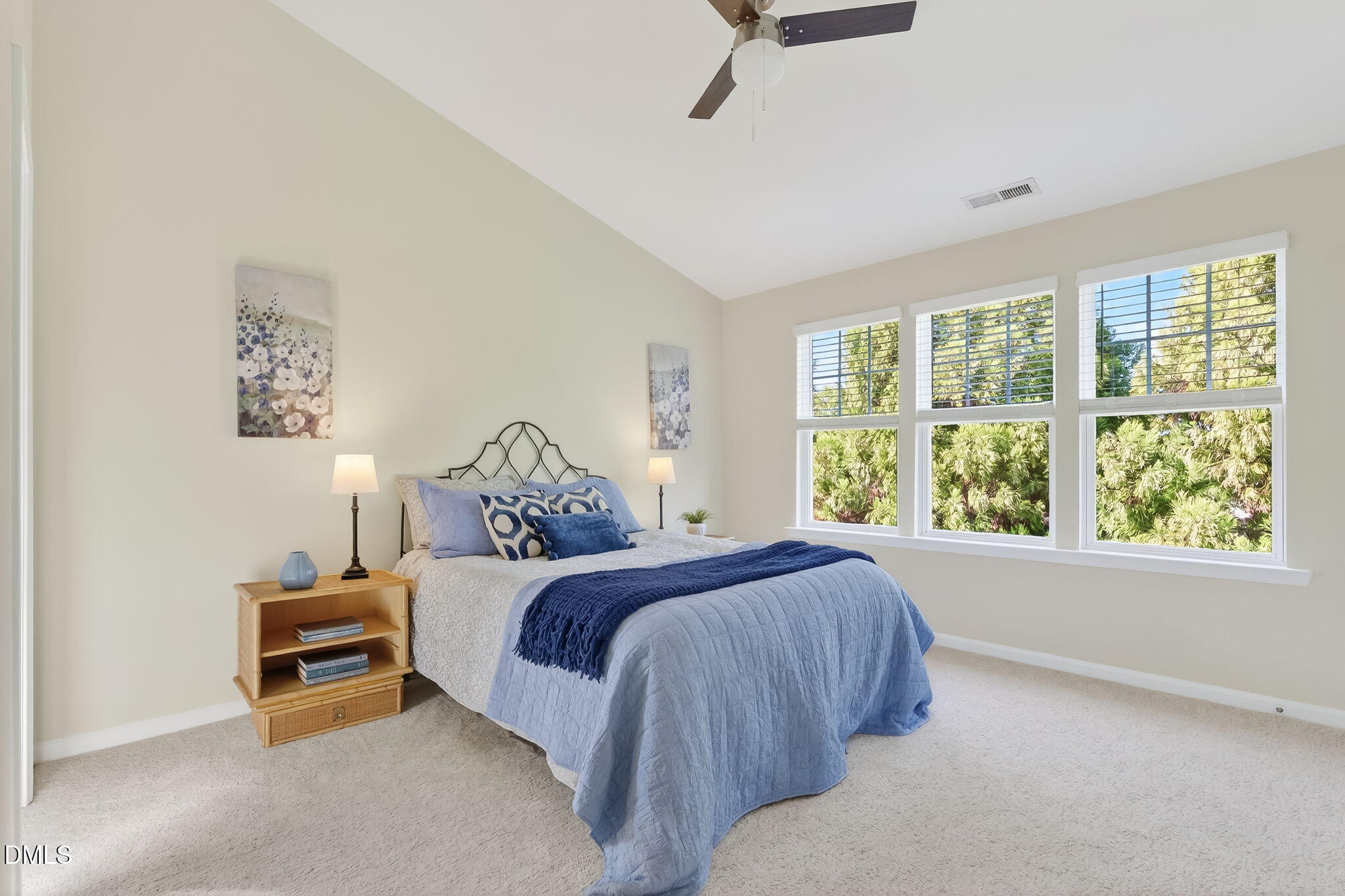 6041 History Trail Raleigh, NC 27612 - Photo 20 of 30 a spacious bedroom with a bed and a window