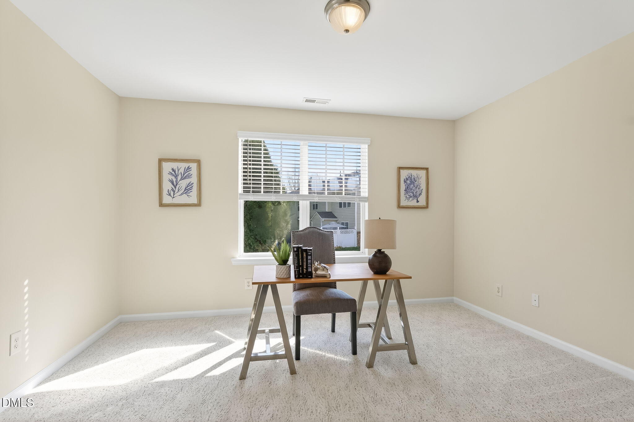 6041 History Trail Raleigh, NC 27612 - Photo 23 of 30 a workspace with furniture and a window