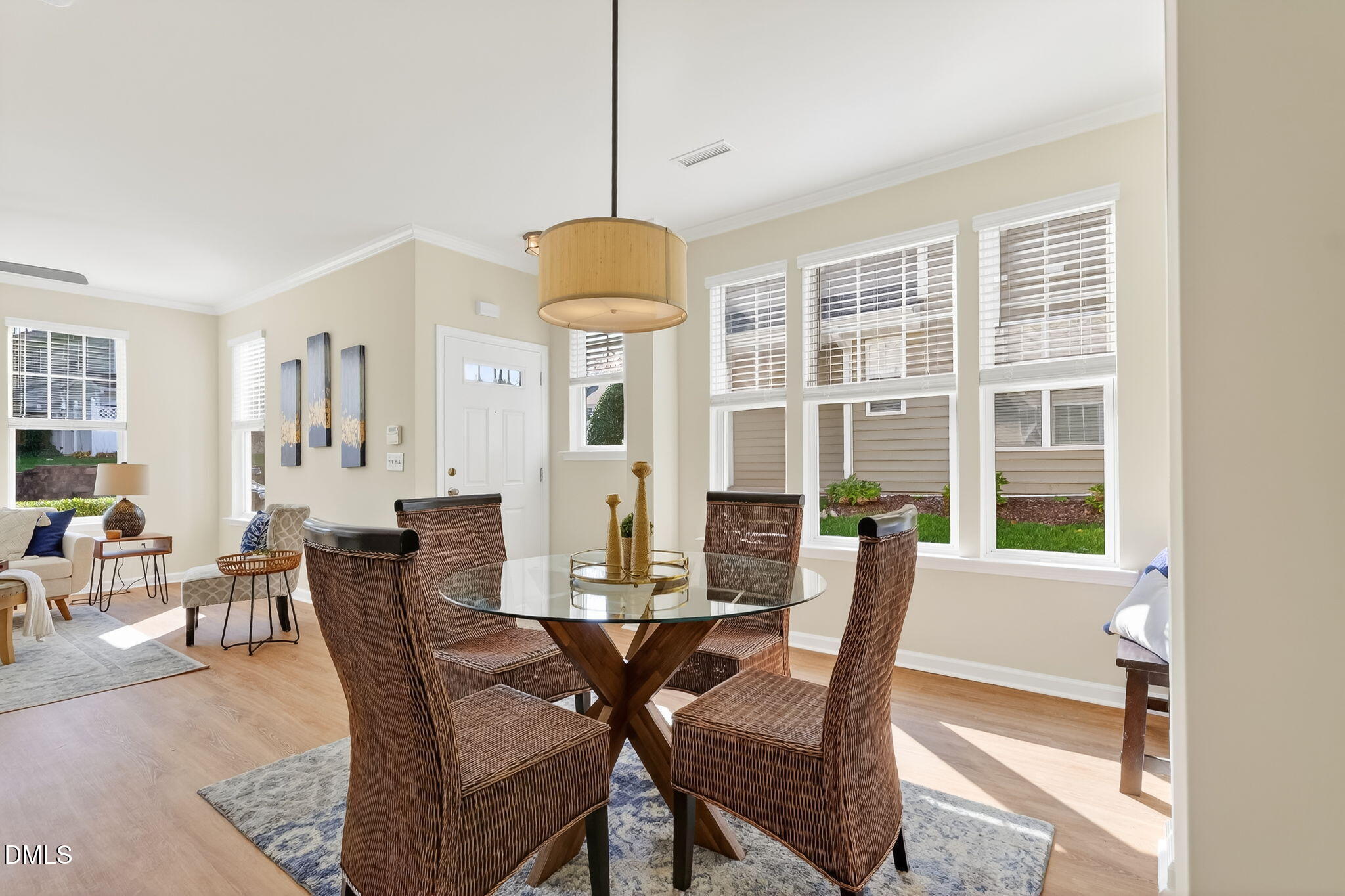 6041 History Trail Raleigh, NC 27612 - Photo 5 of 30 a view of a dining room with furniture window and wooden floor