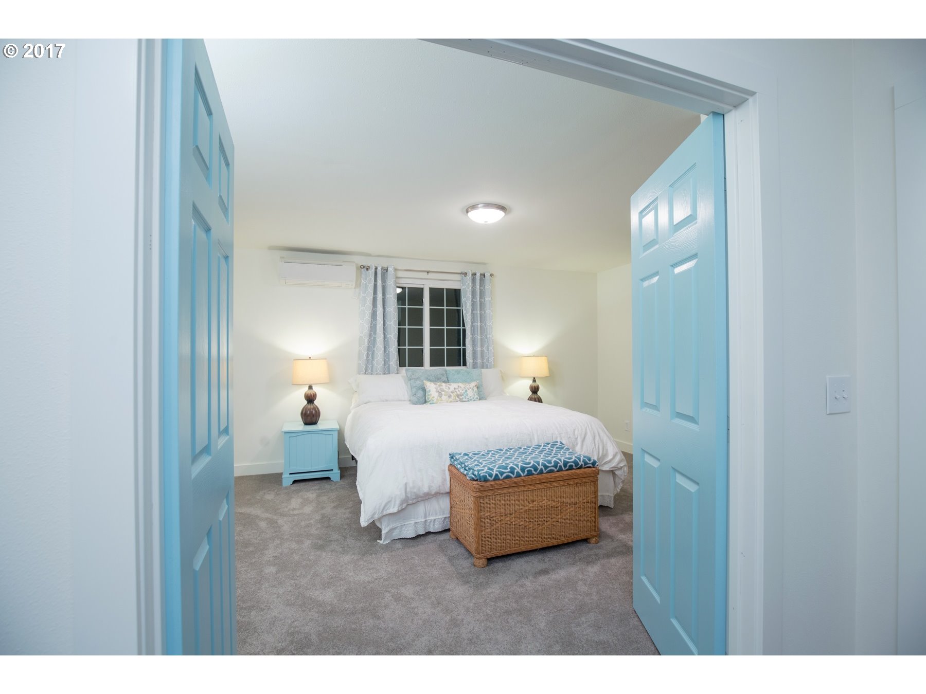 14468 Northwest Larson Road, Unit 3 Portland, OR 97231 - Photo 11 of 20 a spacious bedroom with a bed and window