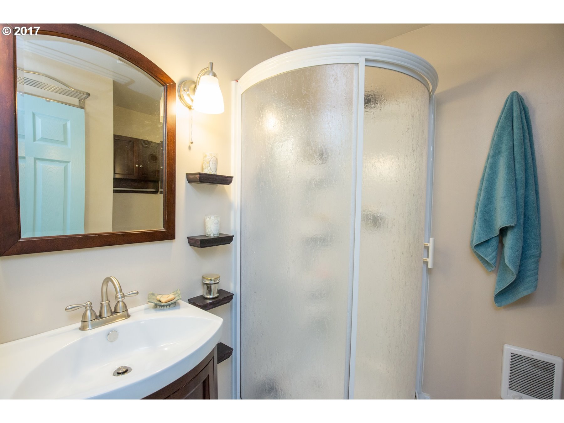 14468 Northwest Larson Road, Unit 3 Portland, OR 97231 - Photo 13 of 20 a bathroom with a sink and mirror
