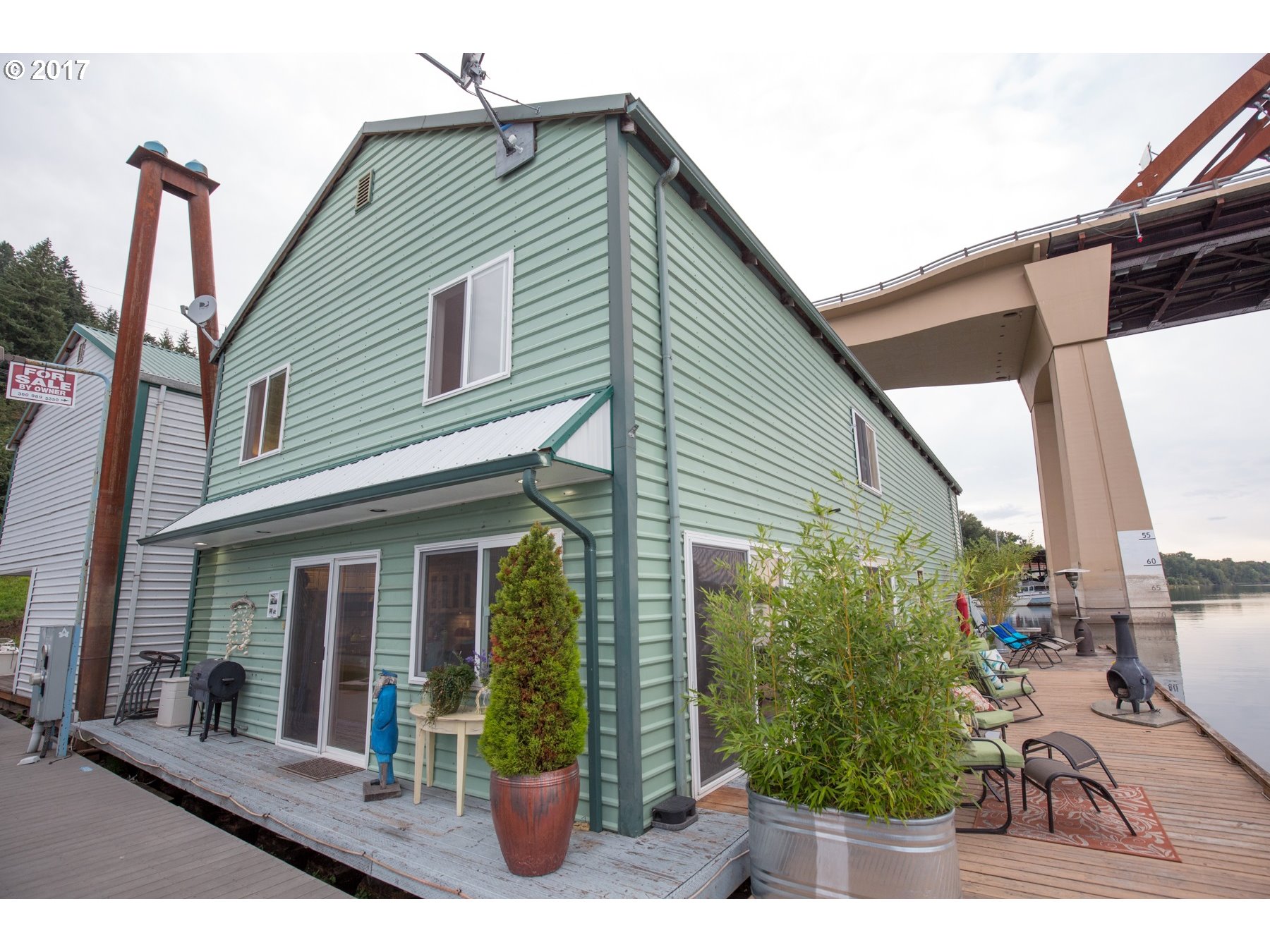 14468 Northwest Larson Road, Unit 3 Portland, OR 97231 - Photo 17 of 20 a view of a house with a porch