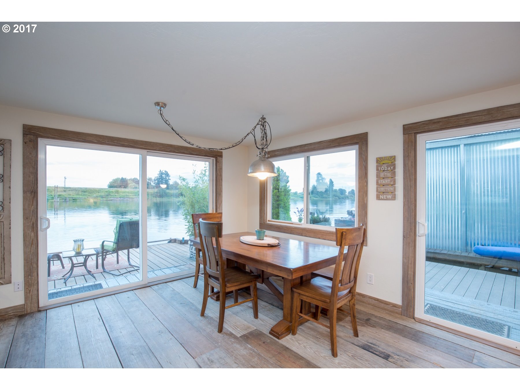 14468 Northwest Larson Road, Unit 3 Portland, OR 97231 - Photo 6 of 20 a dining room with furniture and wooden floor