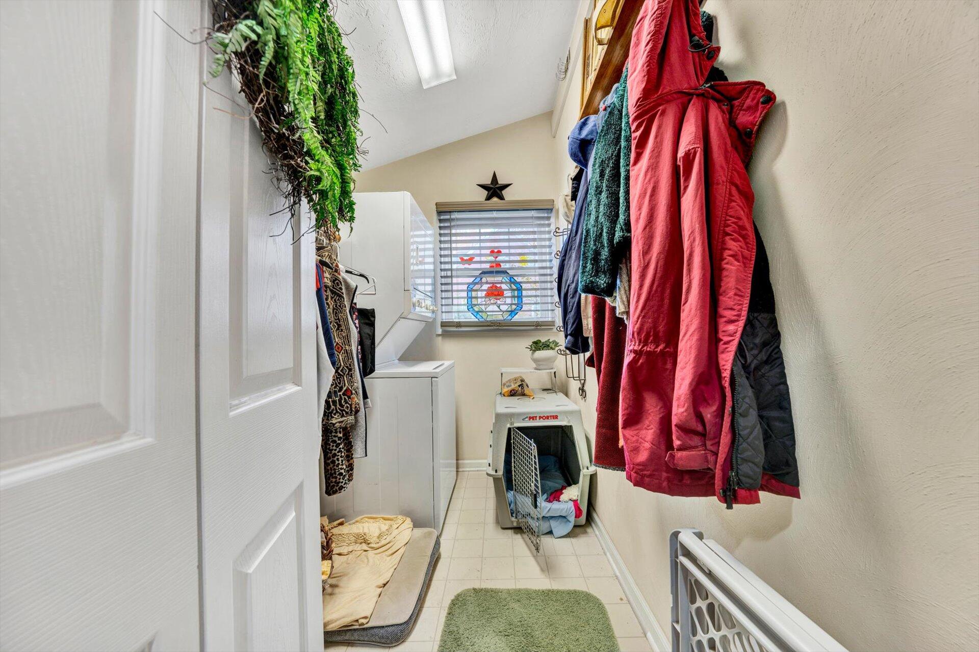 4316 Cove Road Roanoke, VA 24017 - Photo 17 of 31 a view of walk in closet with clothes and shoes