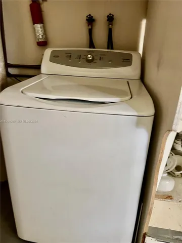 a view of a backyard with a patio