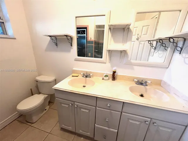 a bathroom with a sink and a toilet