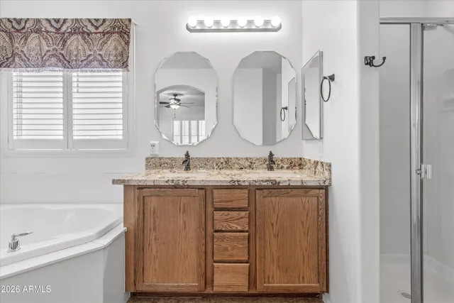 a bathroom with a bathtub and a sink