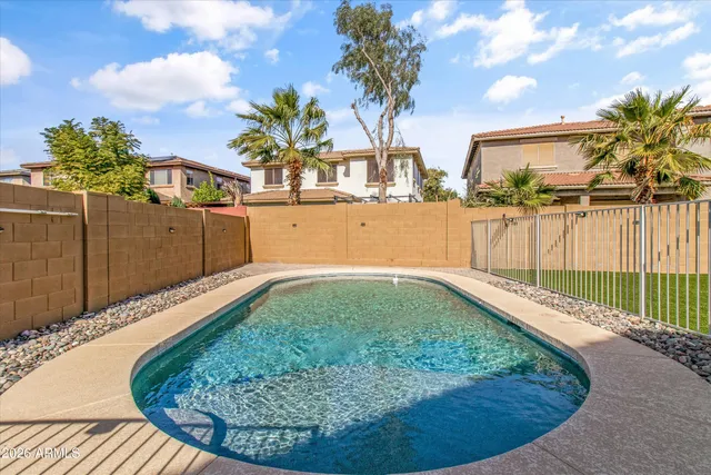 a view of a garden with an ocean