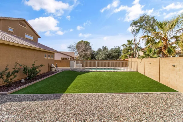 an aerial view of a house with a garden