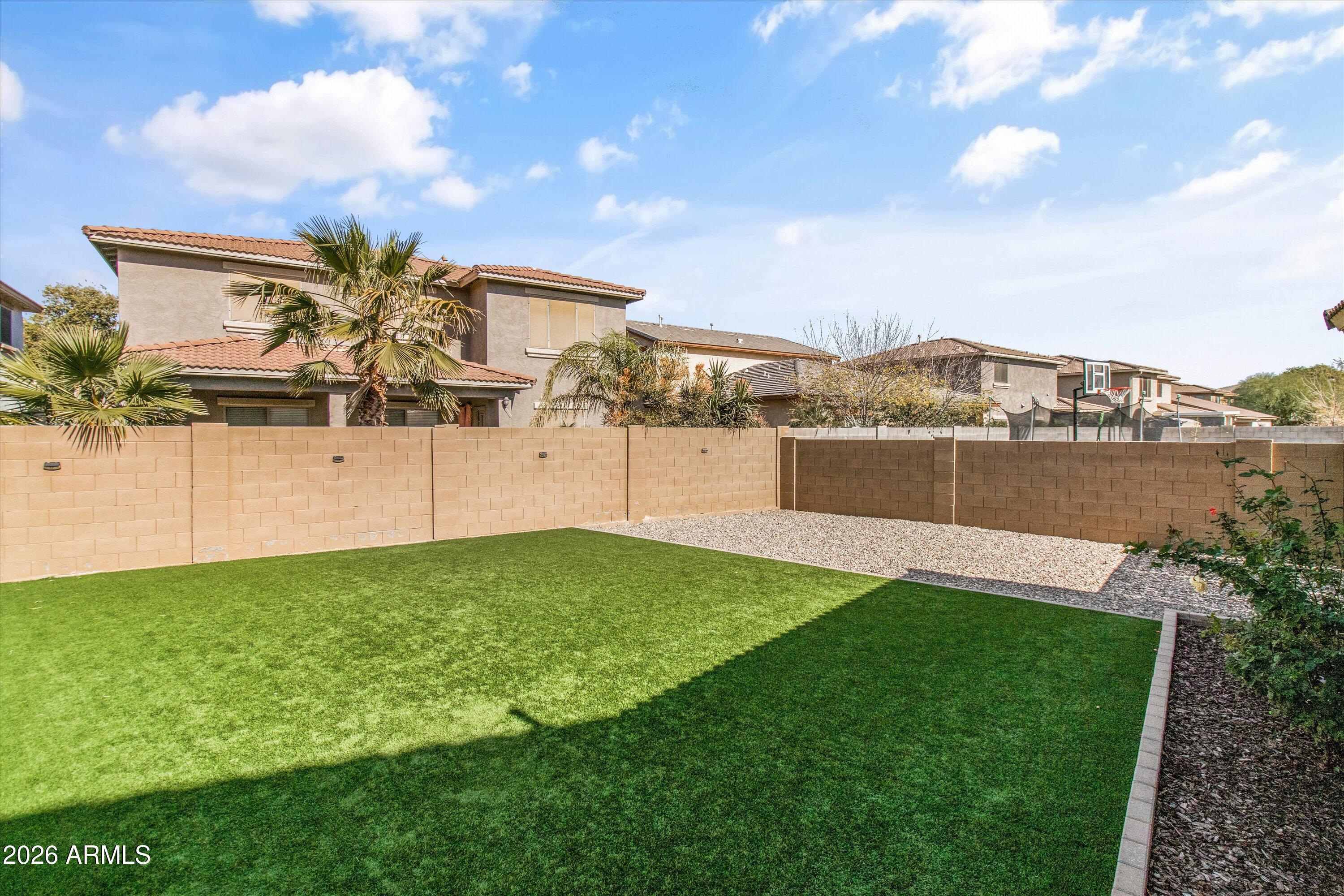 16510 West Tether Trail Surprise, AZ 85387 - Photo 39 of 47 a view of a garden with an ocean