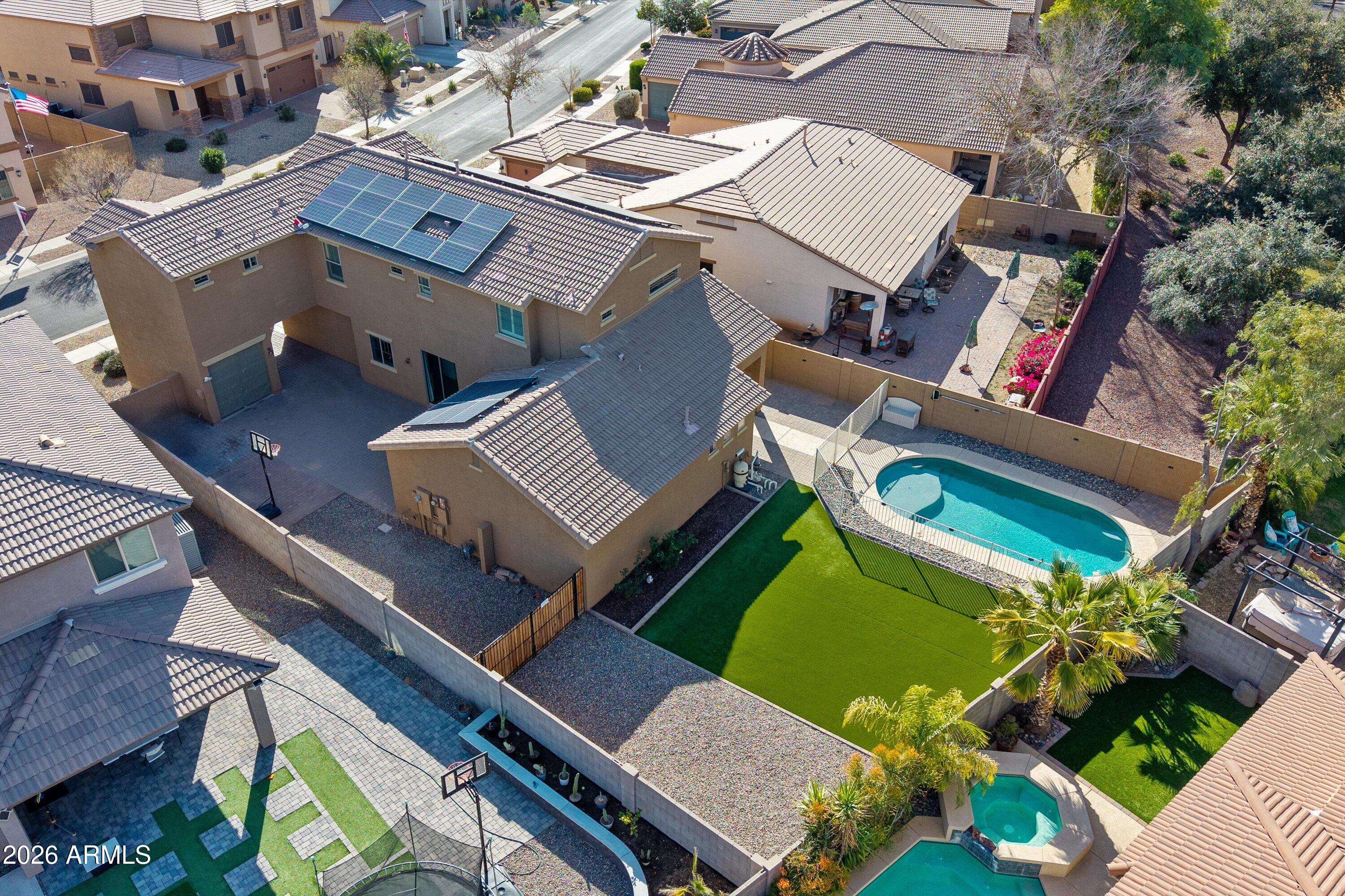 16510 West Tether Trail Surprise, AZ 85387 - Photo 40 of 47 an aerial view of a house with a garden