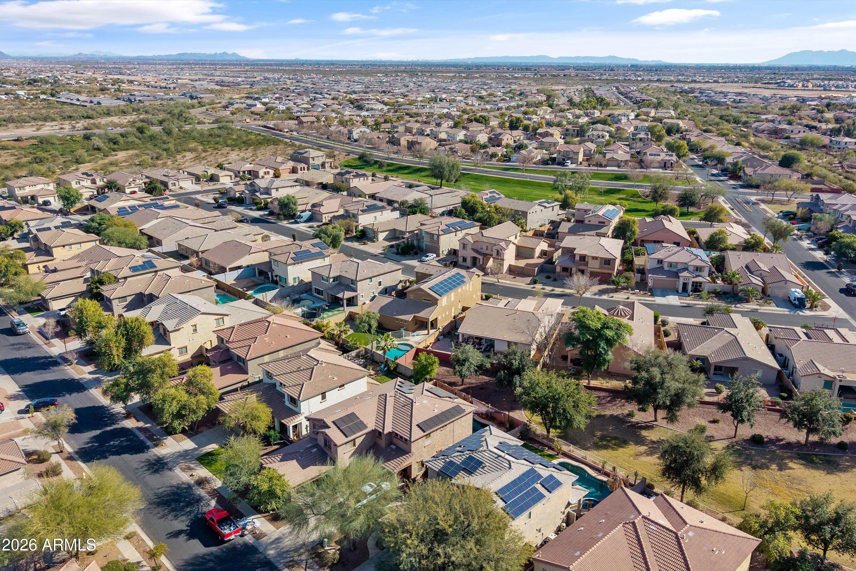 16510 West Tether Trail Surprise, AZ 85387 - Photo 44 of 47 an aerial view of a city with lots of residential buildings