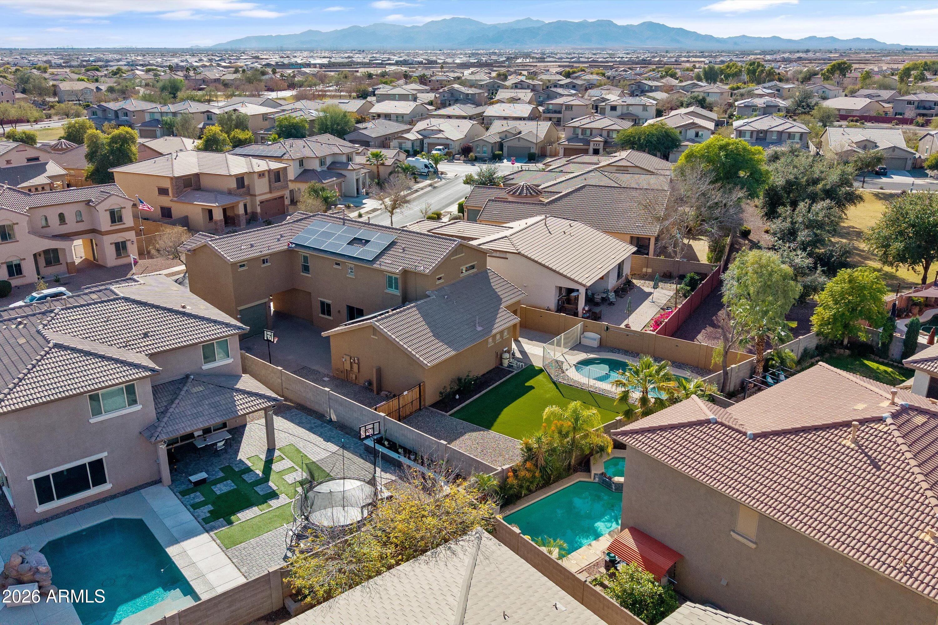 16510 West Tether Trail Surprise, AZ 85387 - Photo 46 of 47 an aerial view of residential houses with outdoor space